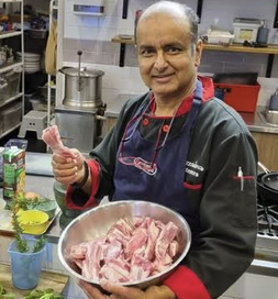 a person preparing food in a kitchen